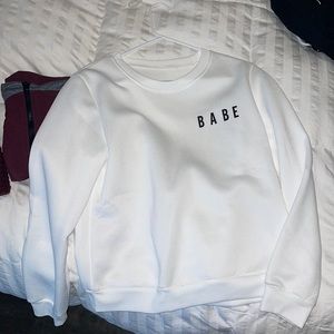 White sweater. Never worn